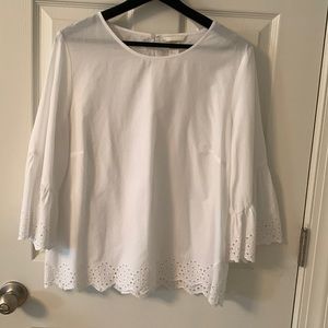 Woman’s white, eyelet trim H&M Blouse